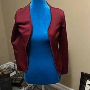 Size small maroon suit jacket. This would be at your waist